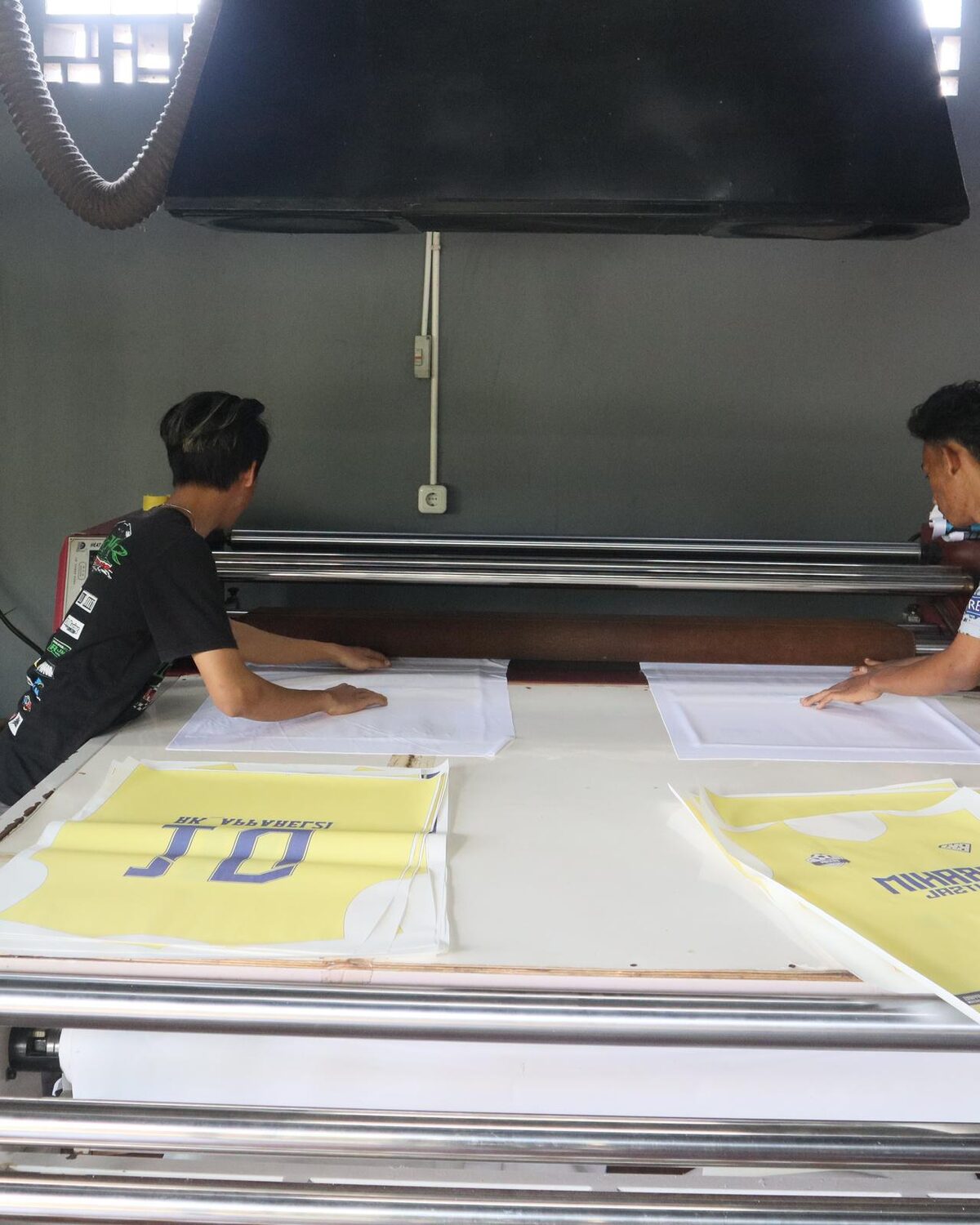 Roll sublimation printing of fabric