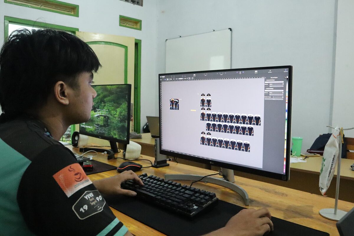 Designer preparing artwork and layout for printing